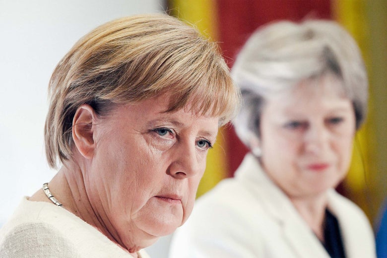 German chancellor Angela Merkel and U.K. Prime Minister Theresa May are seen during a press conference at Lancaster House on Tuesday in London.